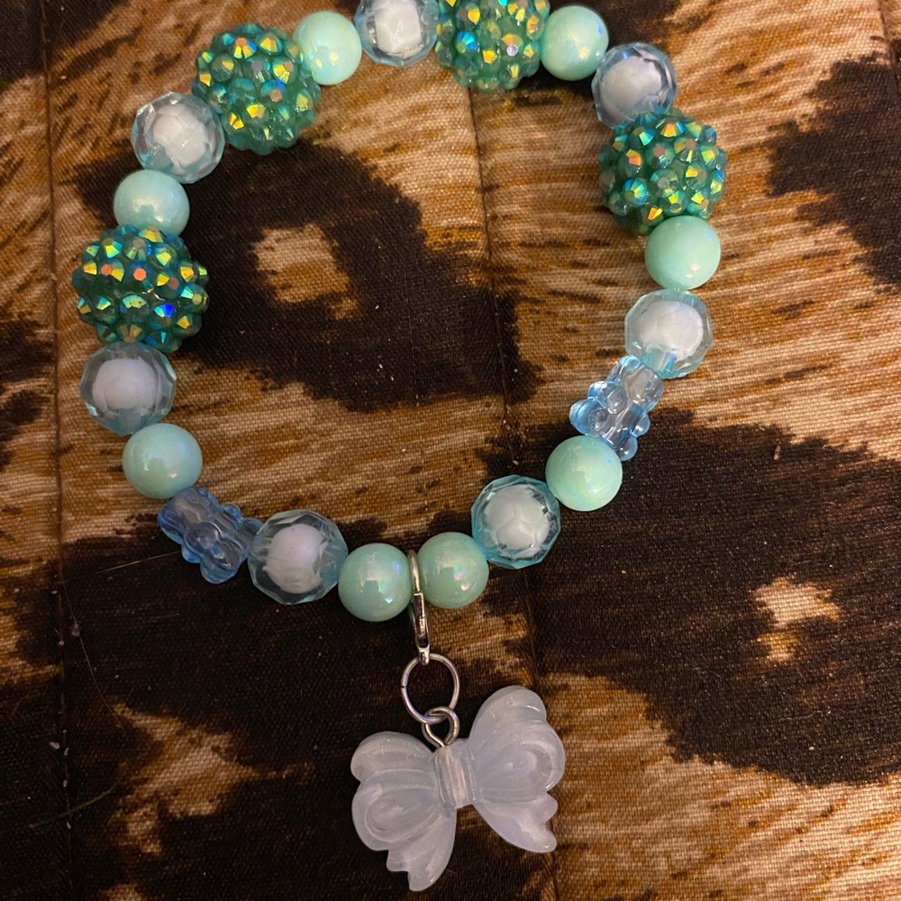 Handcrafted bracelet with gummy bears and a butterfly charm